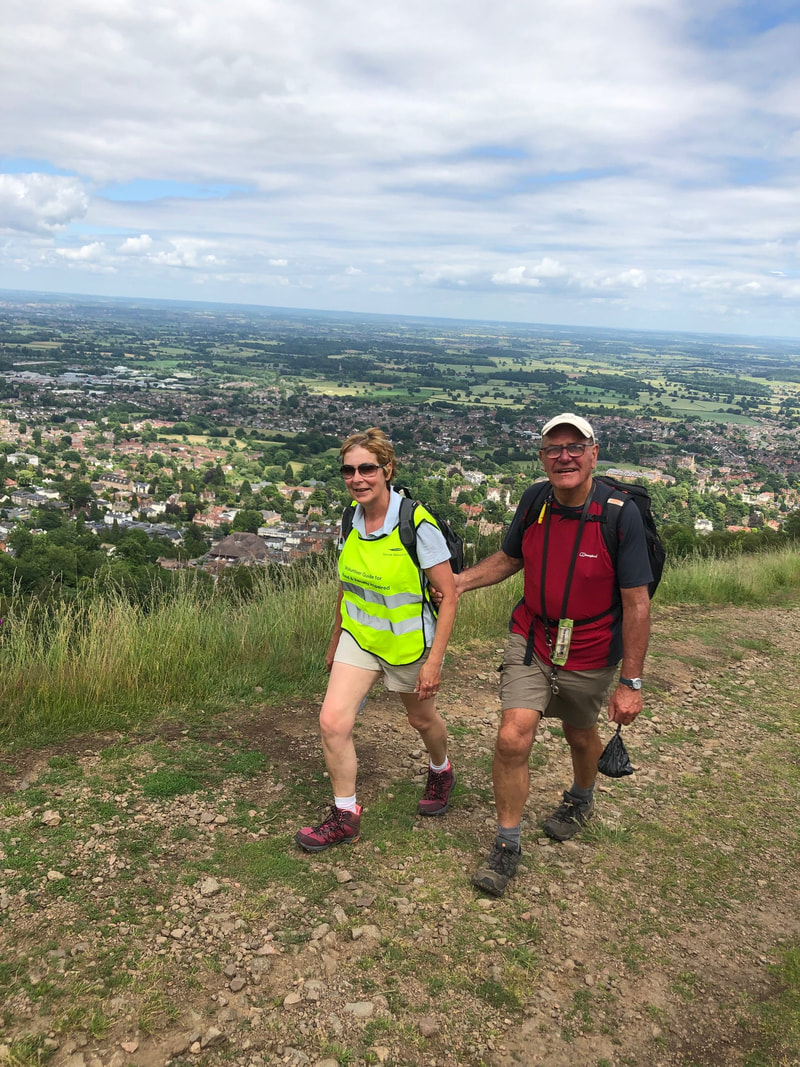 Guide and VI walker on the Malverns