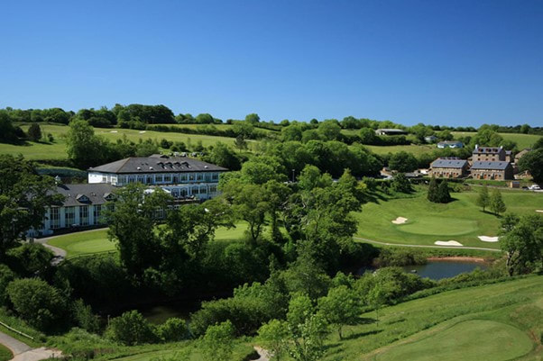 View of the Dartmouth Golf and Country Hotel from above on a sunny day.